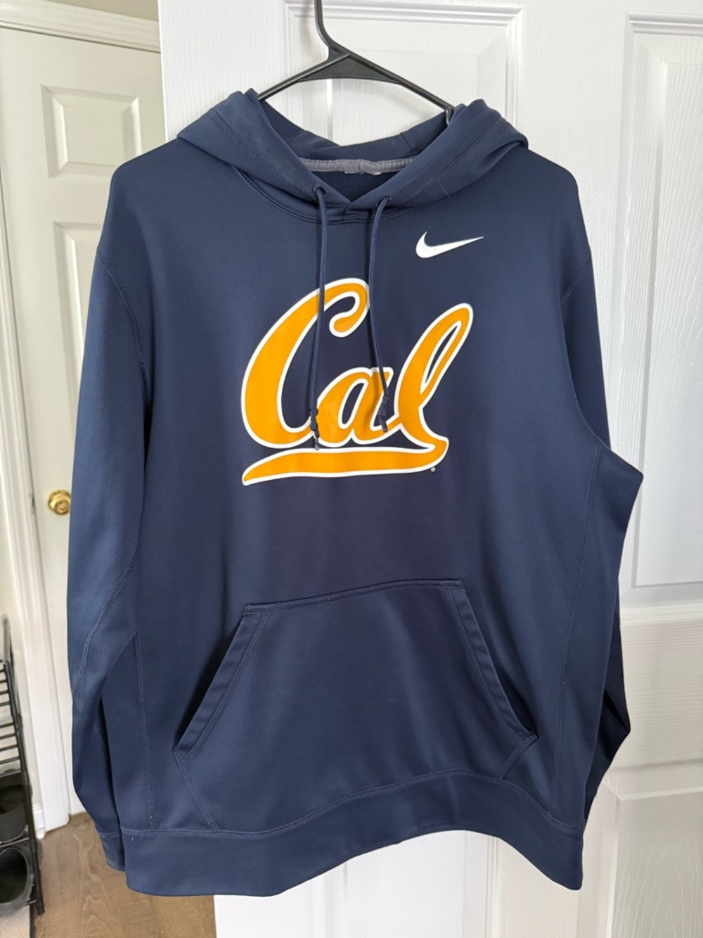 Nike Men's Navy Hoodie with Gold Cal Script
